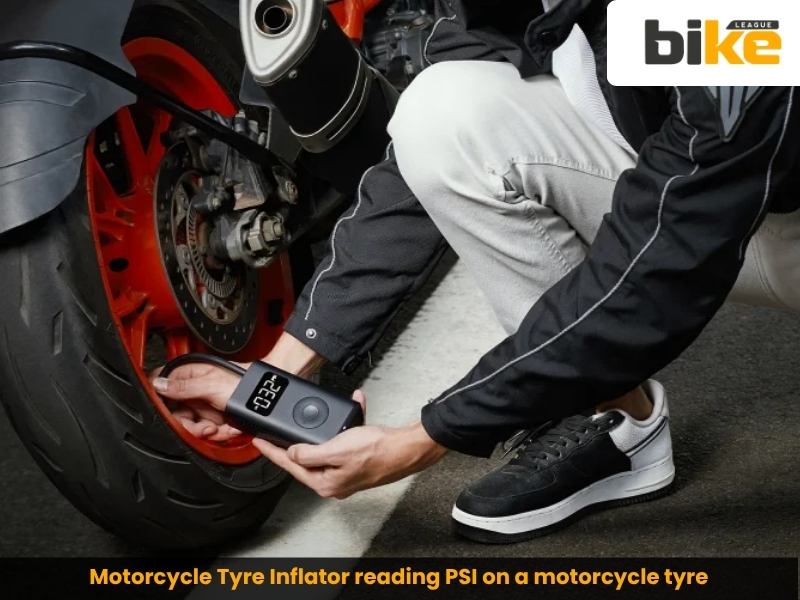 Motorcycle Tyre Inflator reading PSI on a motorcycle tyre