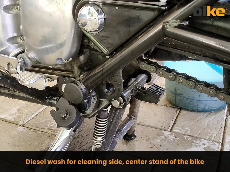 Diesel wash for cleaning side, center stand of the bike